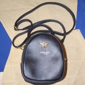 ALUDA Piju Classic Bai Black Crossbody Bag With 12ft Strap Drop Asking Only $35